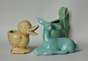 A grouping of animal planters used in print design.