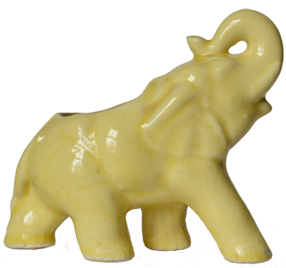 Vintage yellow ceramic elephant used on tee shirts